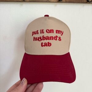 Red and Tan Baseball Hat With Put It On My Husband’s Tab Embroidery